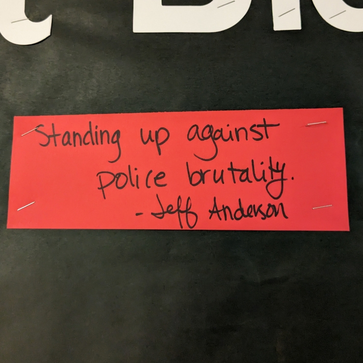 "Stand up against police brutality"
